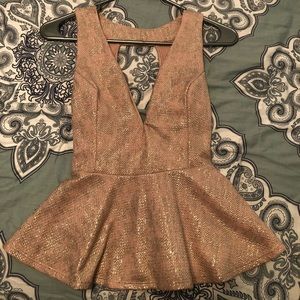 Blush and gold peplum top